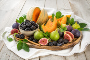 Fruits dete prunes figues et melon